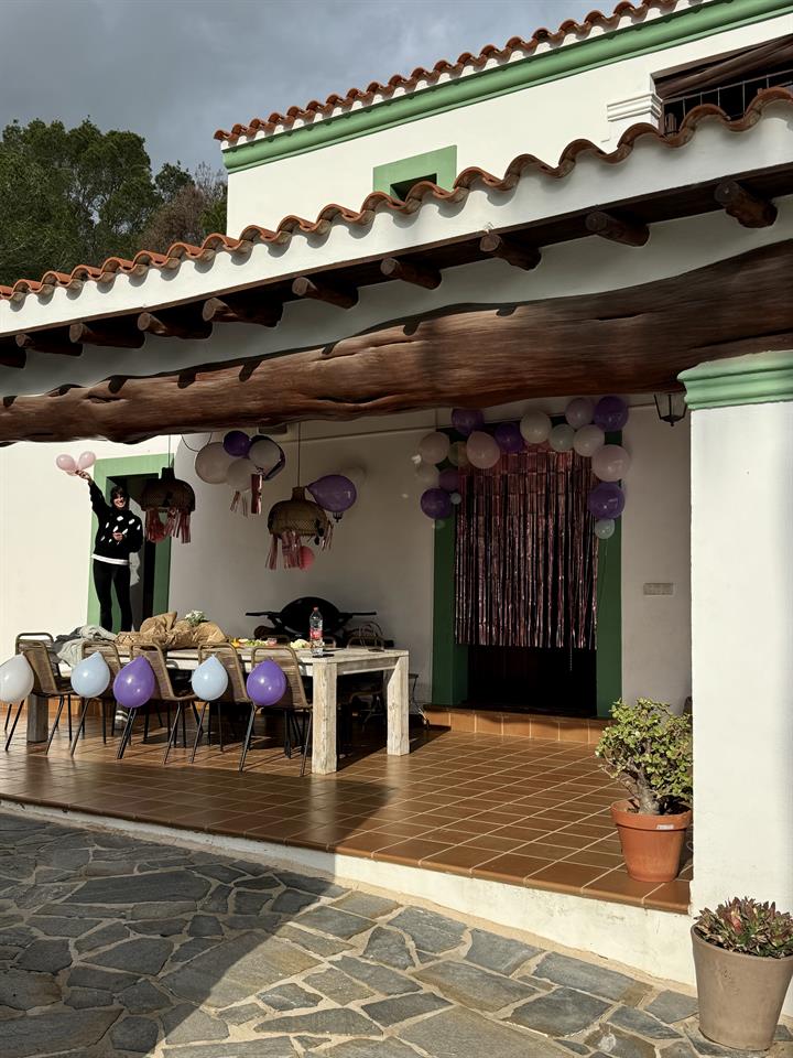The covered terrace decorated for a party