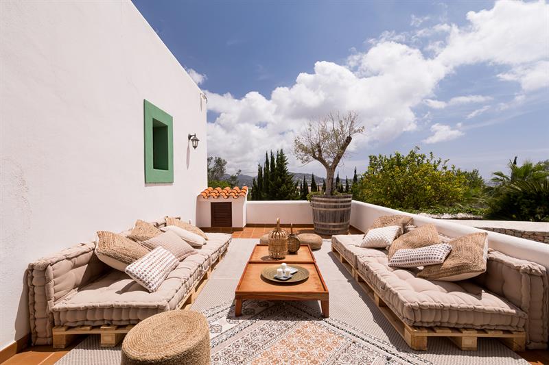 Roof terrace with sofas and countryside views